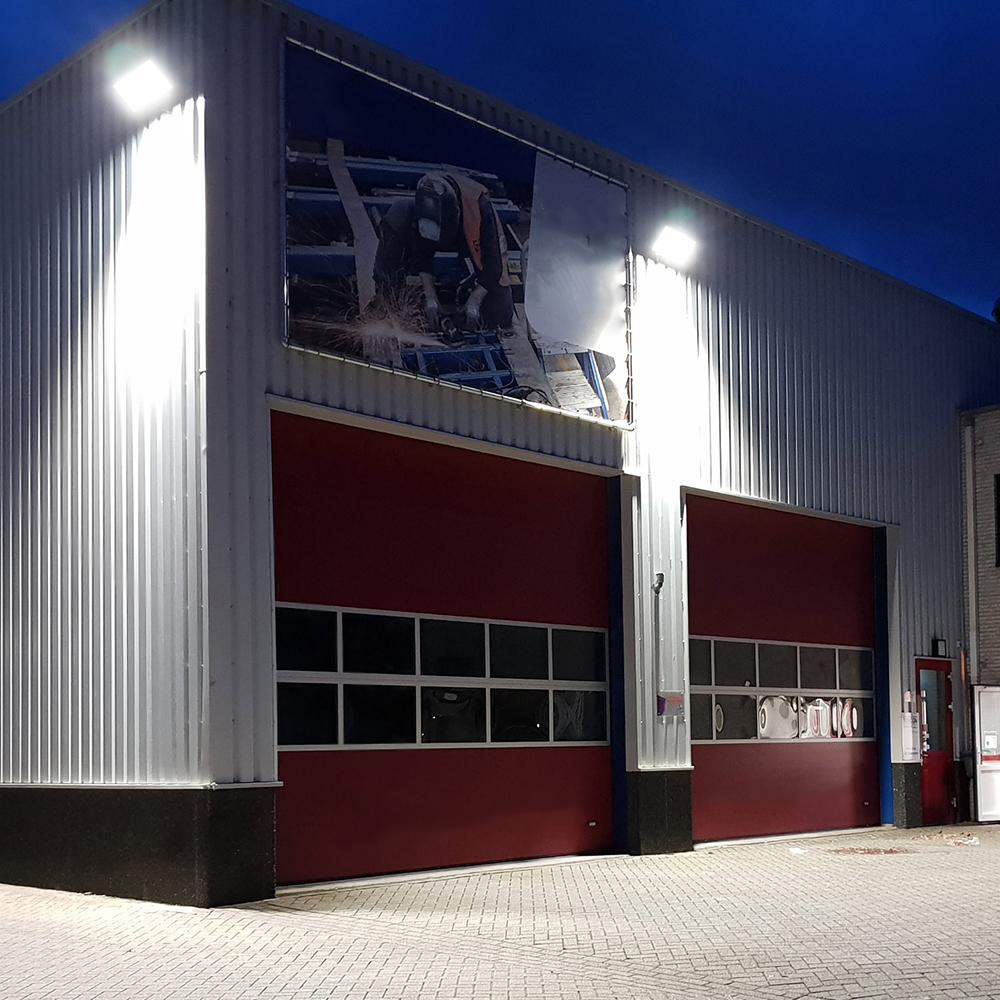 100W LED floodlight on the facade of the production hall